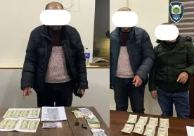 Андижонда арзонга сотилган долларлар қалбаки бўлиб чиқди фото