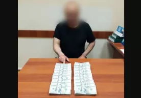 “Hi-tech bank”dagi “kamchilik”ni yopib berish uchun 500 ming dollar pora olgan firibgarlar qo‘lga olindi фото