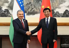 Shavkat Mirziyoyev xitoylik yuqori martabali amaldor bilan uchrashdi фото