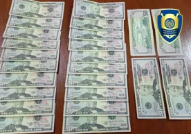 Qarzini qalbaki dollarlar bilan uzgan «uddaburon» ushlandi фото