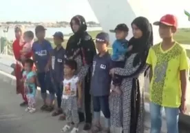 Terrorchilik harakati a’zosi bo‘lgan ayollar farzandlari bilan O‘zbekistonga qaytarildi (video) фото