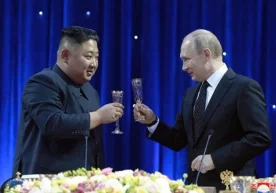 Putin o‘ldiga chiqarilgan do‘stini medal bilan siyladi фото