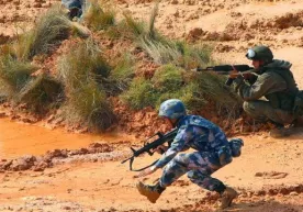 Хитой денгиз-пиёда қўшинлари сонини тўрт баробарга оширади фото