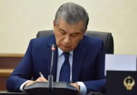 Prezident farzandlikka olish bo‘yicha qonunni imzoladi фото