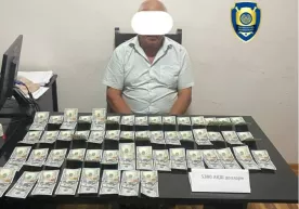 Қашқадарёда 5300 долларни қарийб 60 млн сўмга айирбошлаган валютафуруш ушланди фото