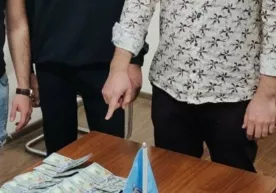 Samarqandda «zamdekan» pora olayotib qo‘lga tushdi фото