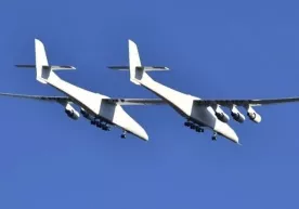 АҚШда улкан эгизак корпусли самолёт муваффақиятли синовдан ўтказилди фото