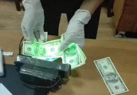 Тошкентда «Чорсу»даги савдо жойи учун 500 доллар пора сўраган бозор ходими қўлга тушди фото