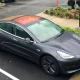 Tesla электрокарлари ёмғир вақтида ойналарини автоматик ёпишни ўрганиб олади