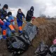 Ғазодаги оммавий қабрлардаги жасадларнинг камида 20 таси тириклай кўмилгани маълум қилинди